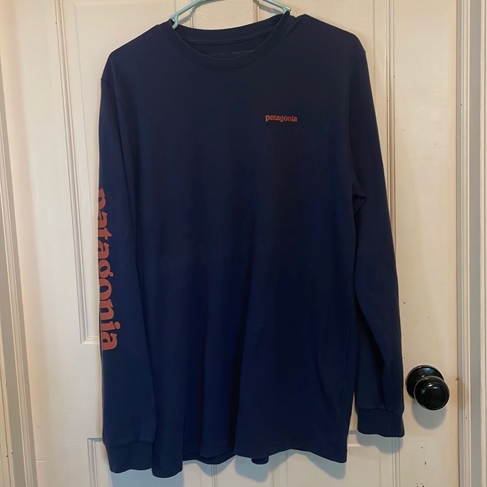 Patagonia Blue Long Sleeve Tee‎ with orange writing size medium EUC